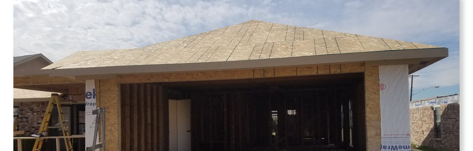 Garage damage before rehab at 5705 Diana Dr
