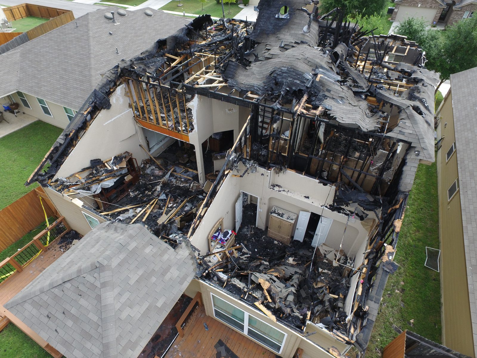 Aerial view before fire rehab at 5231 Roan Brk